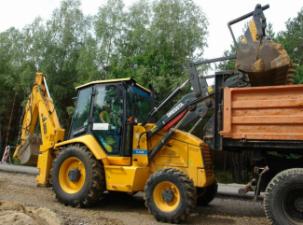 Buldoexcavatoare Dressta 9.50