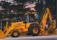 Buldoexcavatoare John Deere Construction 710 B