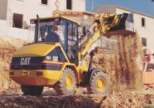 Încărcătoare pe roți Caterpillar 902