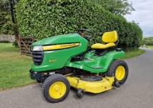 Mașini de tuns iarba Ride on și Tractoare de grădină John Deere X320