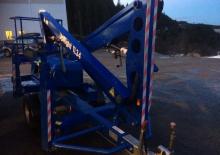 Nacele cu braț articulat montate pe camion UpRight TL 34