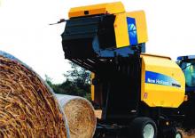 Prese de balotat rotunde New Holland BR7070 Raffer